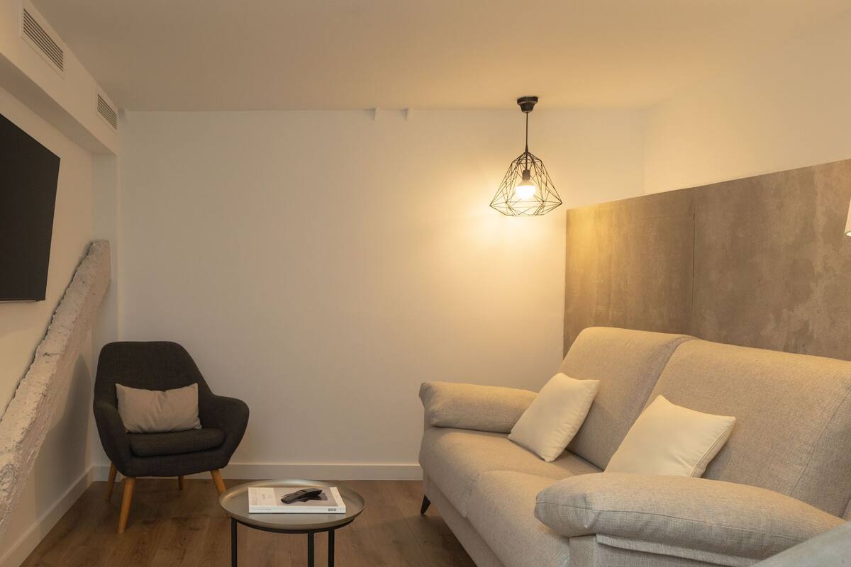 tayko attic suite | living area | tv