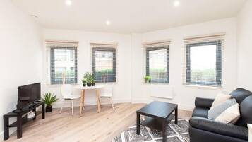 Apartment, Ground Floor | Living area | Flat-screen TV