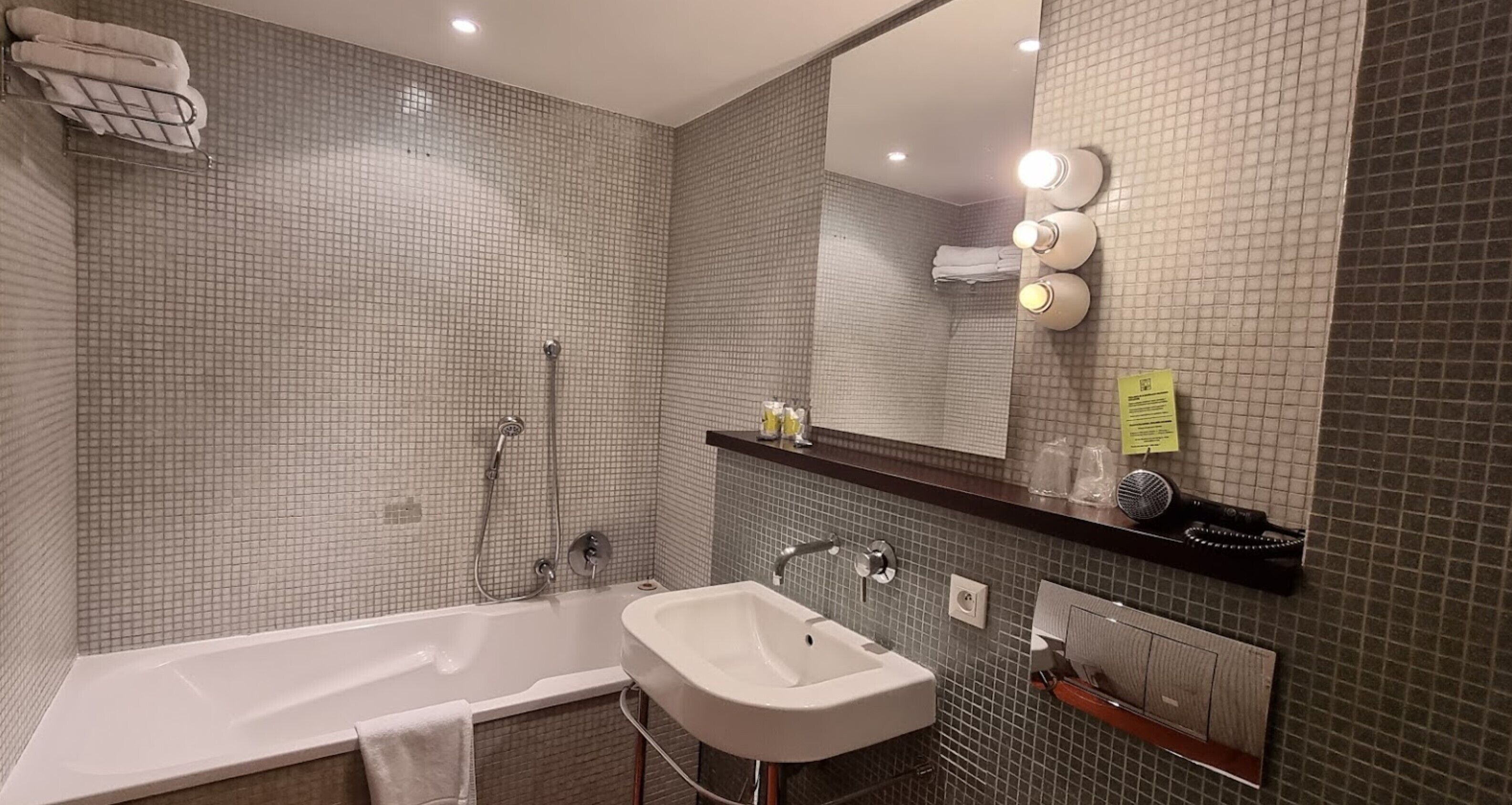 superior room | bathroom | bathtub, free toiletries, hair dryer, bathrobes