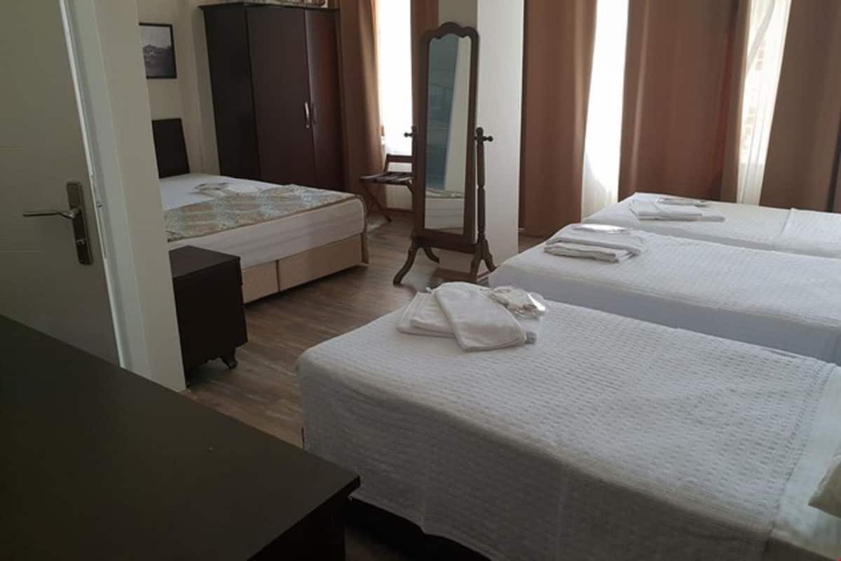 Chambre Quadruple Familiale, vue jardin, en front de plage | Draps italiens Frette, literie de qualité supérieure
