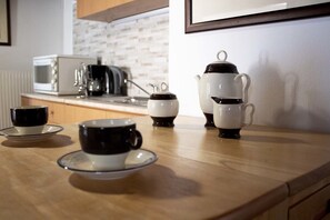 Chambre Confort, côté cour intérieure | Cuisine privée