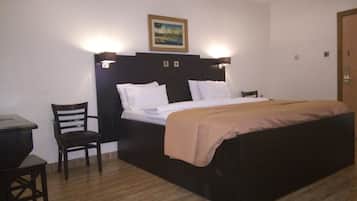 Suíte executiva, 1 cama Queen, para não fumantes | Escrivaninha, cortinas blackout, Wi-Fi de cortesia, roupa de cama