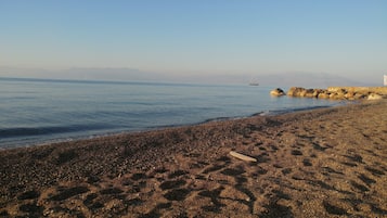 On the beach, sun-loungers, beach towels, 3 beach bars