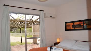 Departamento, varias camas | Cortinas blackout y ropa de cama