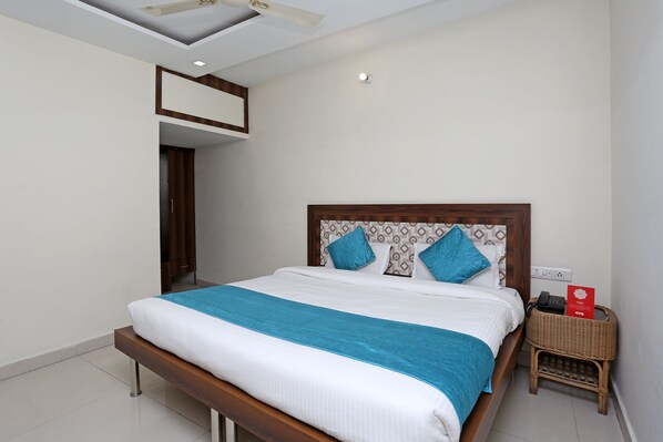 Chambre Deluxe Double ou avec lits jumeaux, 1 très grand lit | Draps fournis