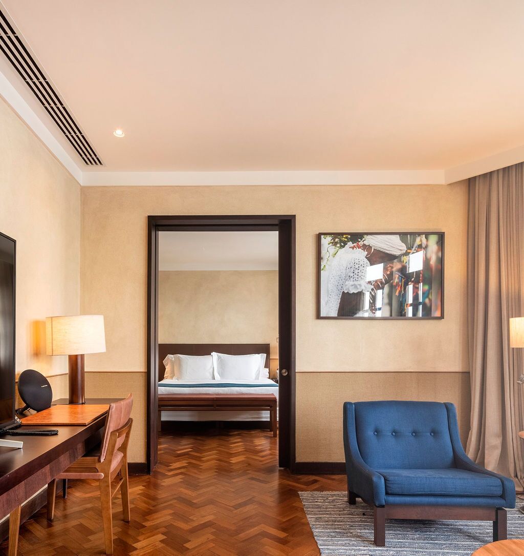 deluxe suite, oceanfront | living area | 50-inch flat-screen tv with cable channels, tv, ipod dock