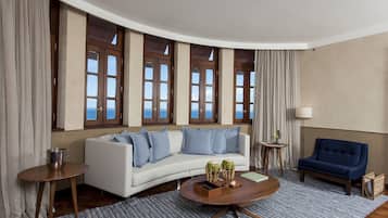 Deluxe Suite, Oceanfront | Living area | 50-inch flat-screen TV with cable channels, TV, iPod dock