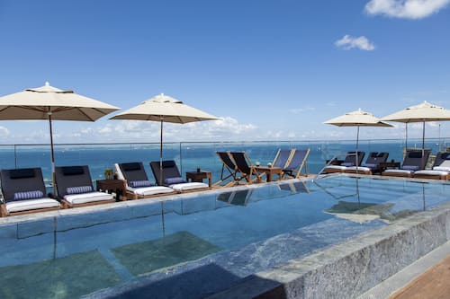 Outdoor pool, open 9:00 AM to 9:00 PM, sun loungers