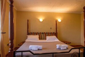 Deluxe Bungalow, Multiple Beds, Non Smoking, Garden View | Iron/ironing board, free WiFi, bed sheets - Imani Suites Runda (Nairobi)