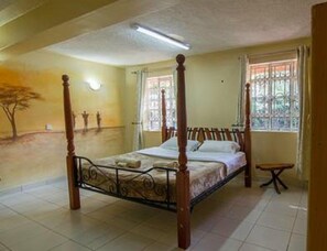 Deluxe Bungalow, Multiple Beds, Non Smoking, Garden View | Iron/ironing board, free WiFi, bed sheets