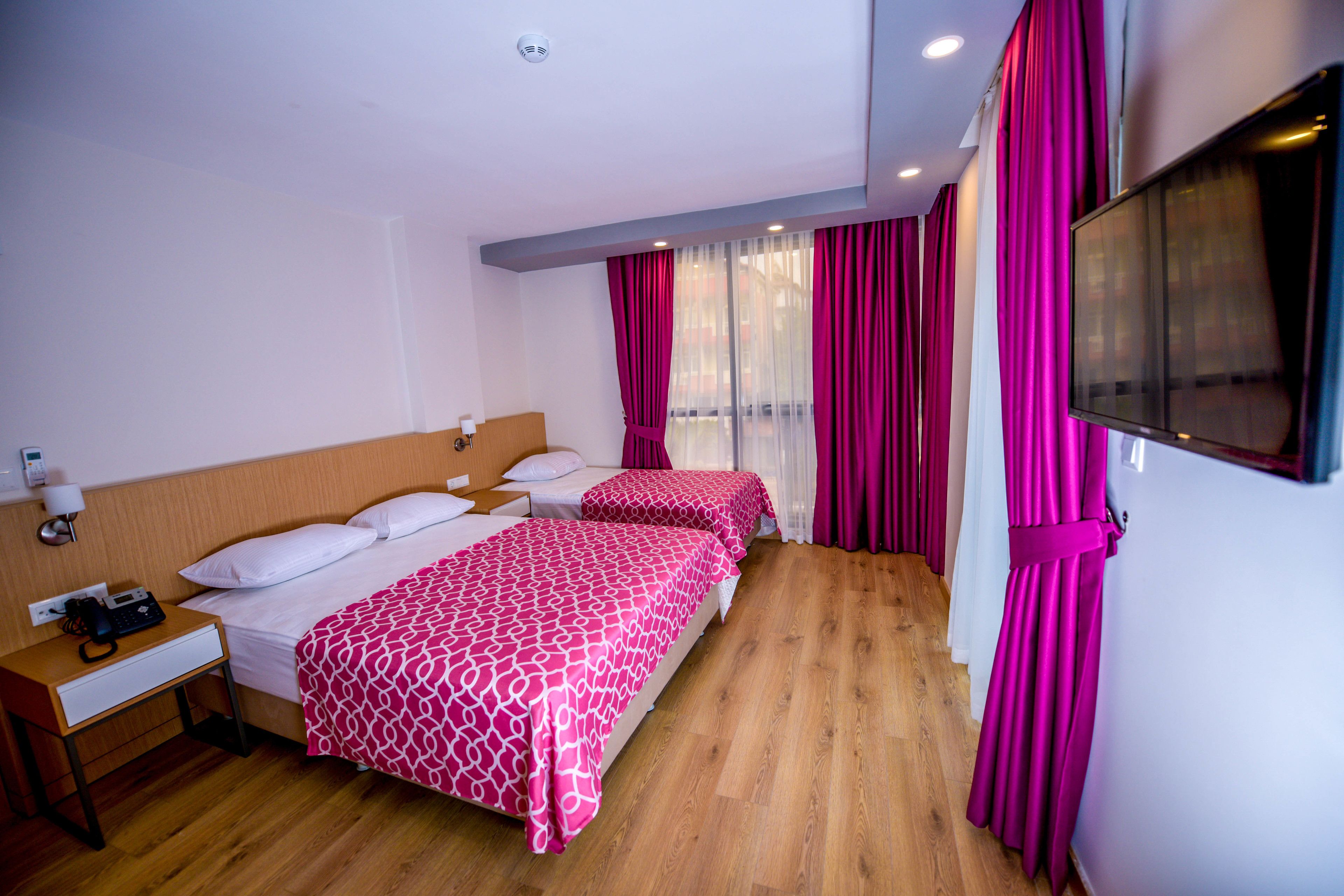 standard triple room | in-room safe, desk, blackout curtains, soundproofing