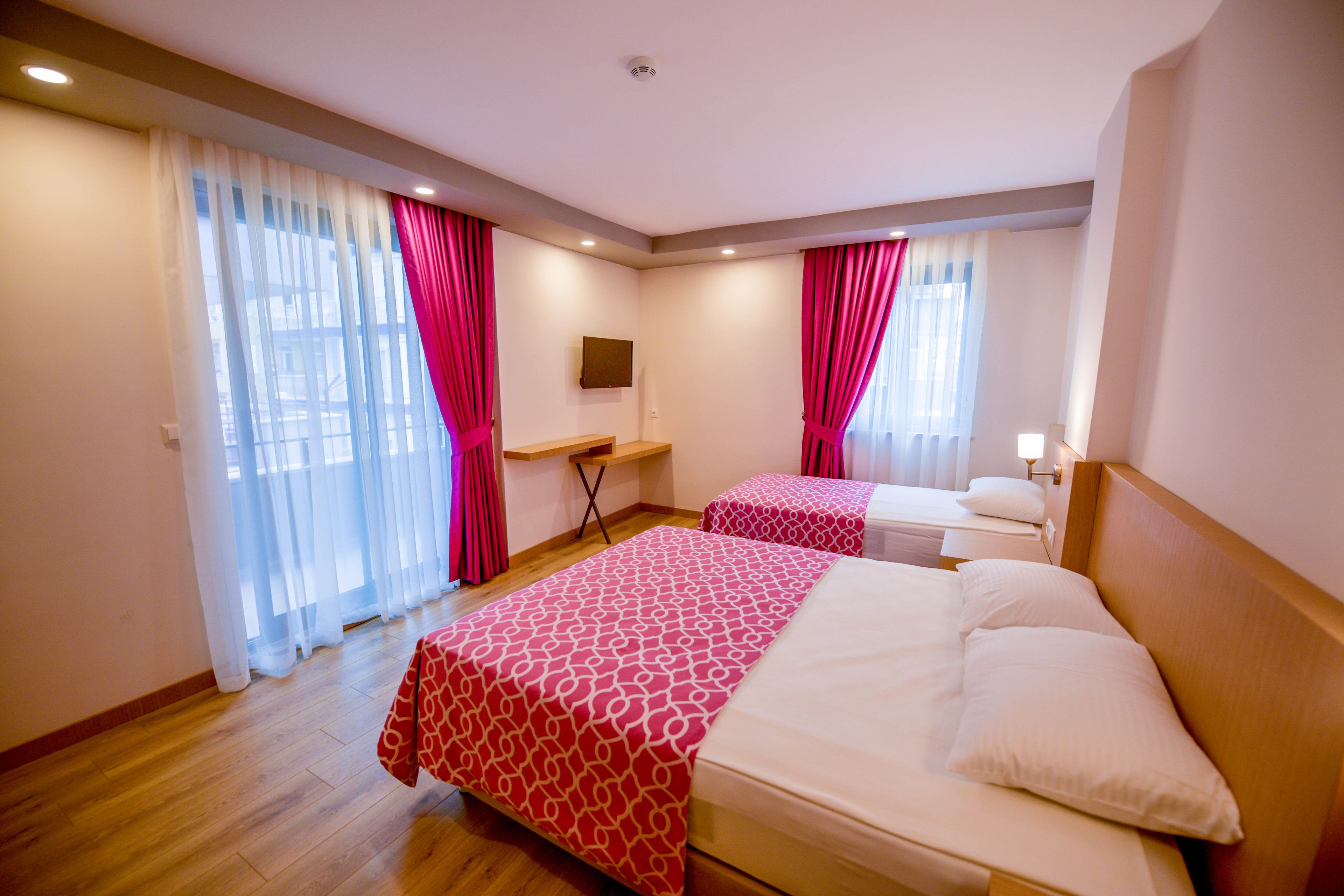 standard triple room | in-room safe, desk, blackout curtains, soundproofing