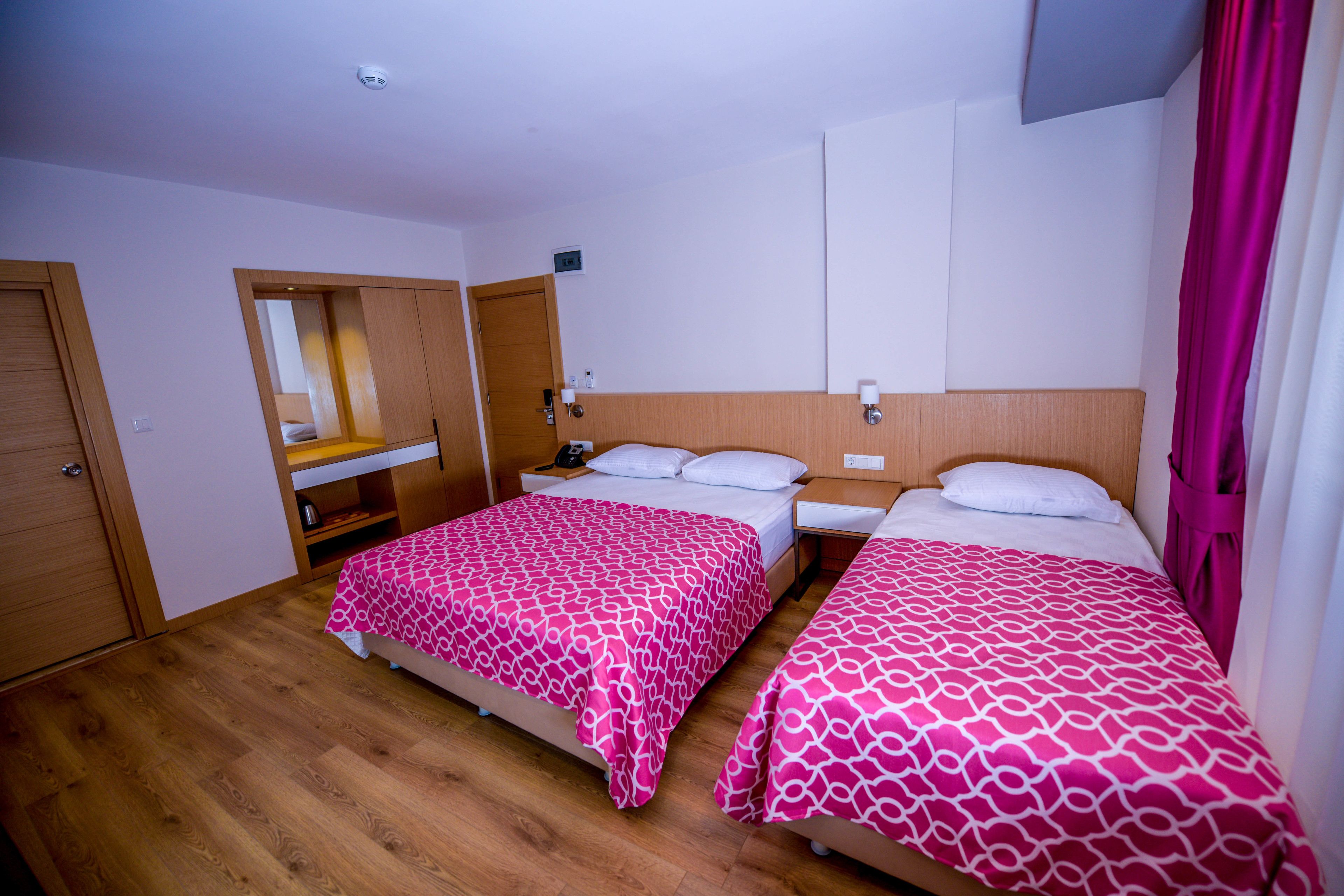 standard triple room | in-room safe, desk, blackout curtains, soundproofing