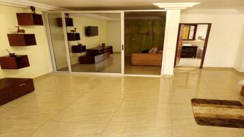 Suite Familiale, 1 très grand lit, non-fumeurs | Salon Exécutif