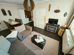 Appartement Familial, 2 chambres (Kapstadt) | Coin séjour | Télévision à écran plat, lecteur de DVD, jouets