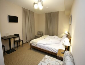 Habitación estándar con 1 cama matrimonial o 2 individuales | Escritorio y wifi gratis