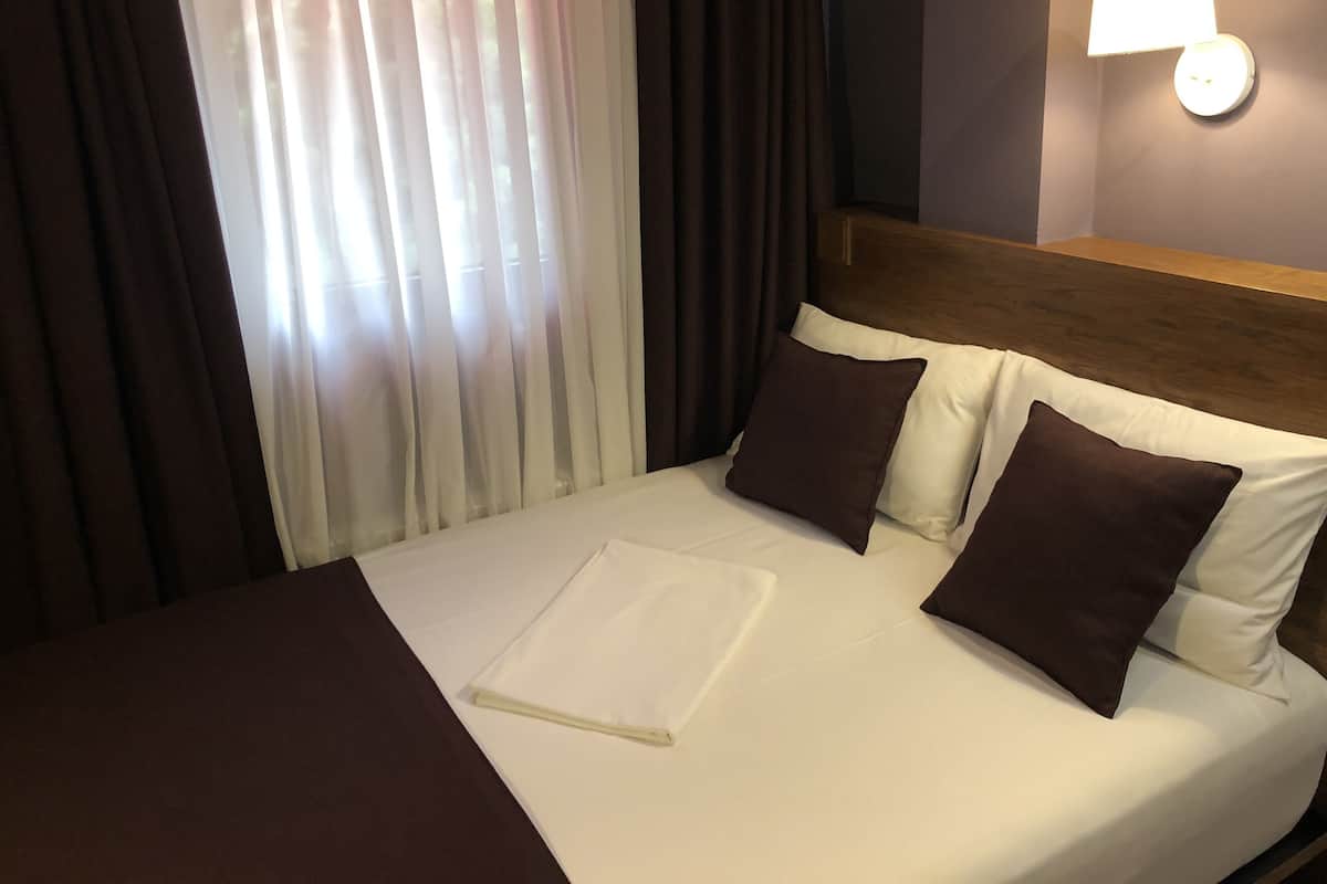 Ropa de cama de alta calidad y minibar