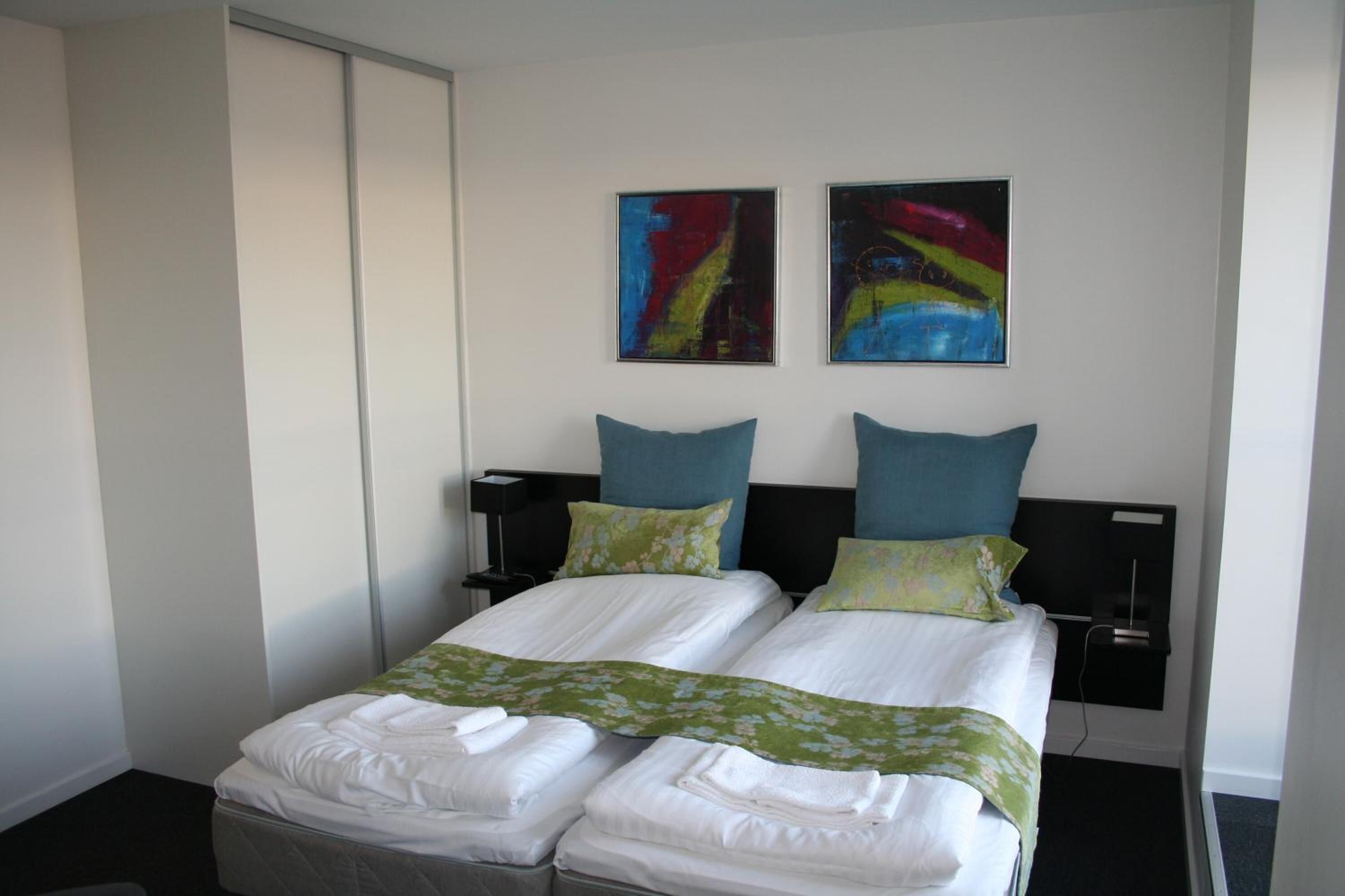 premium bedding, iron/ironing board, free wifi, bed sheets