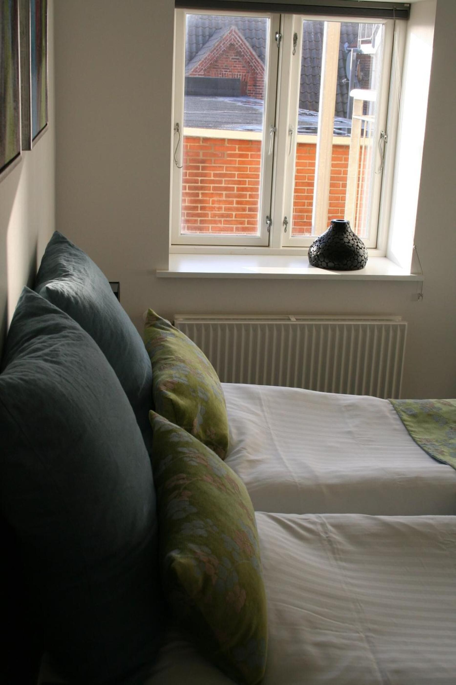 premium bedding, iron/ironing board, free wifi, bed sheets