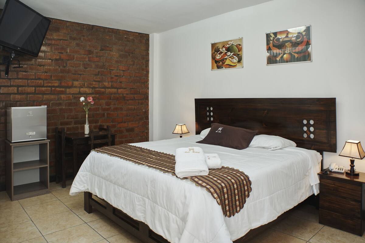 deluxe double room | down duvets, select comfort beds, desk, laptop workspace