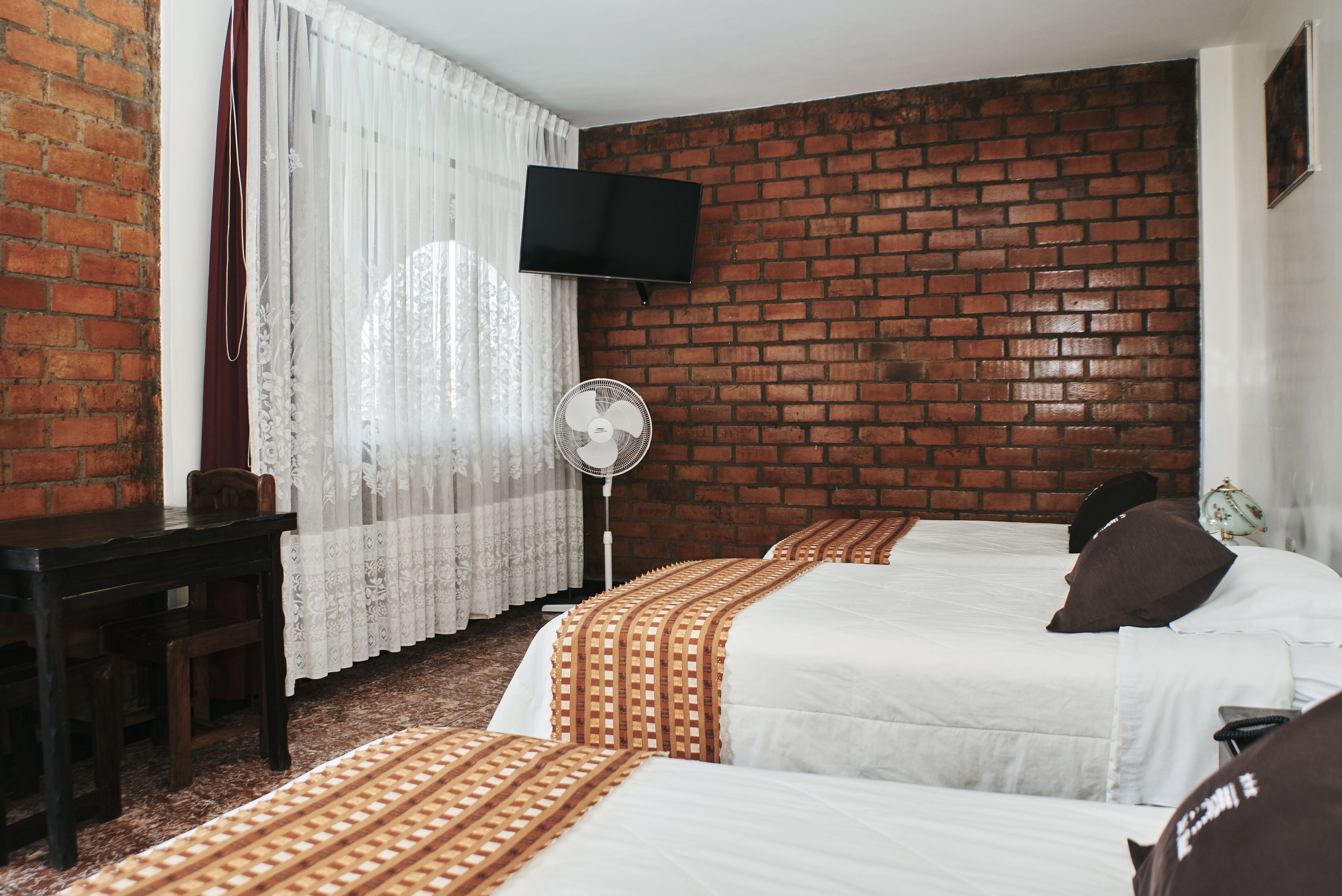 triple room | down duvets, select comfort beds, desk, laptop workspace