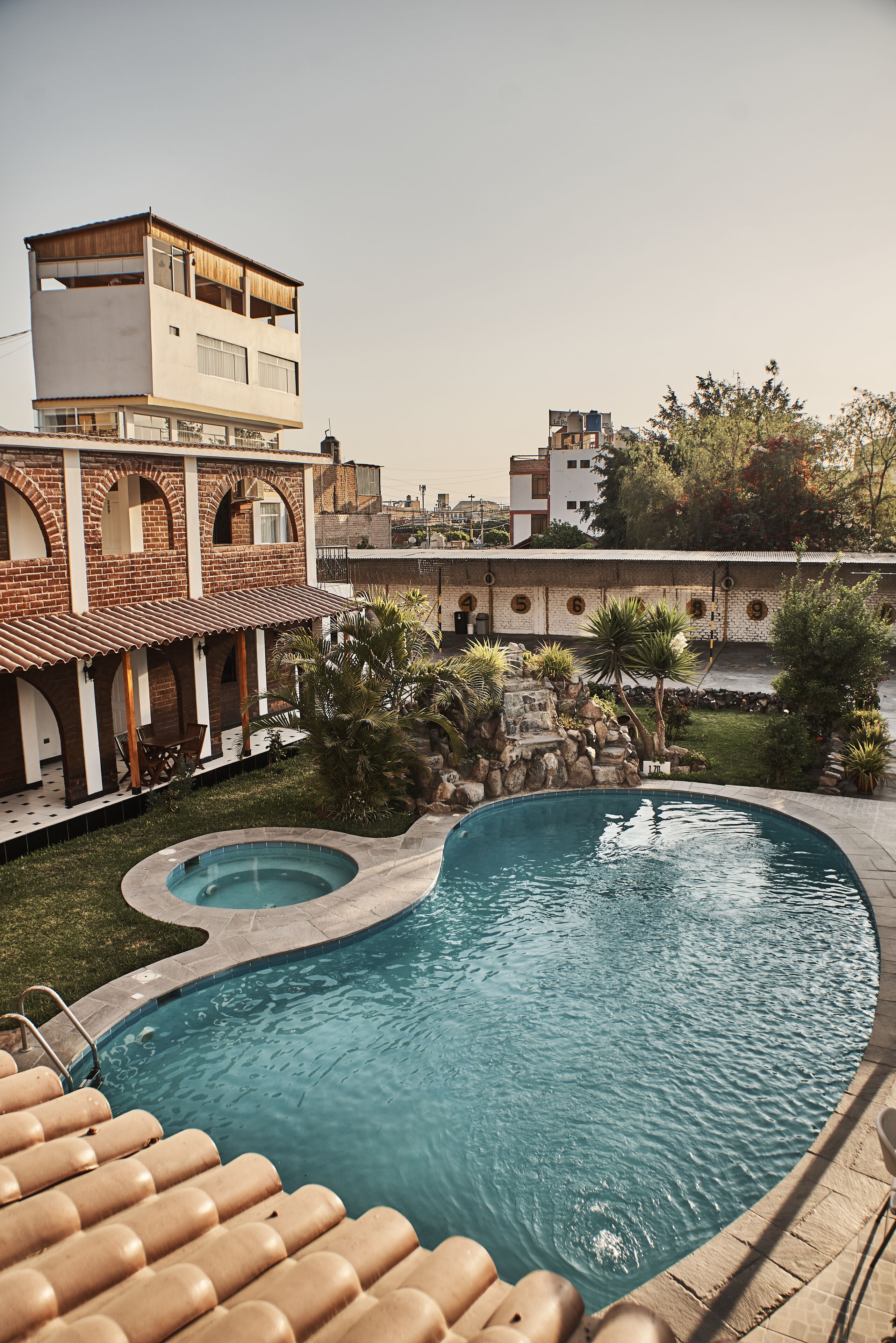 outdoor pool, open 9:00 am to 9:00 pm, pool umbrellas, pool loungers