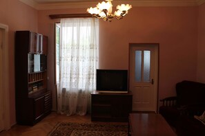 Apartament familiar, vistes al jardí | Equipament de l'habitació