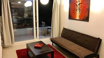 Family Apartment, 2 Bedrooms, Non Smoking, Pool View | Living area | 36-inch flat-screen TV with cable channels, LED TV