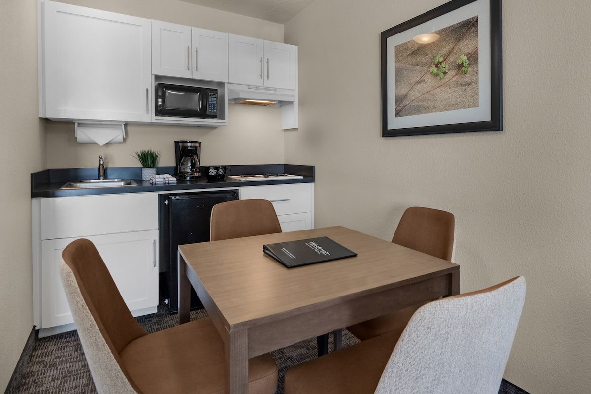 fireplace suite with ocean view | private kitchen | fridge, microwave, paper towels