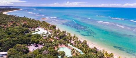 On the beach, sun-loungers
