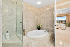Shower, jetted tub, towels