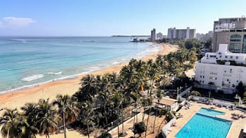 On the beach, sun loungers, beach towels