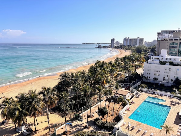 On the beach, sun-loungers, beach towels