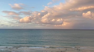 On the beach, sun-loungers, beach towels