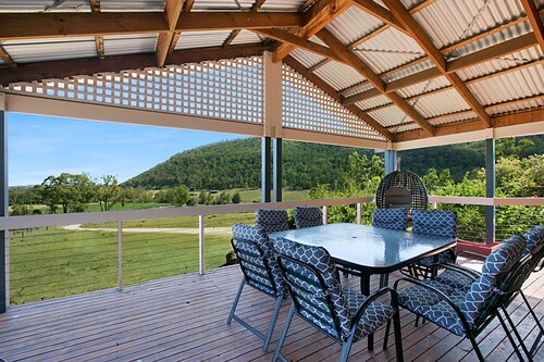 Sprawling country valley views with a hint of wine