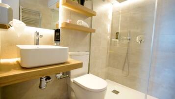 Shower, eco-friendly toiletries, hair dryer, towels
