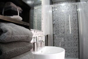 Shower, free toiletries, hair dryer, towels