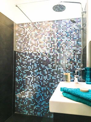 Shower, hair dryer, towels, soap