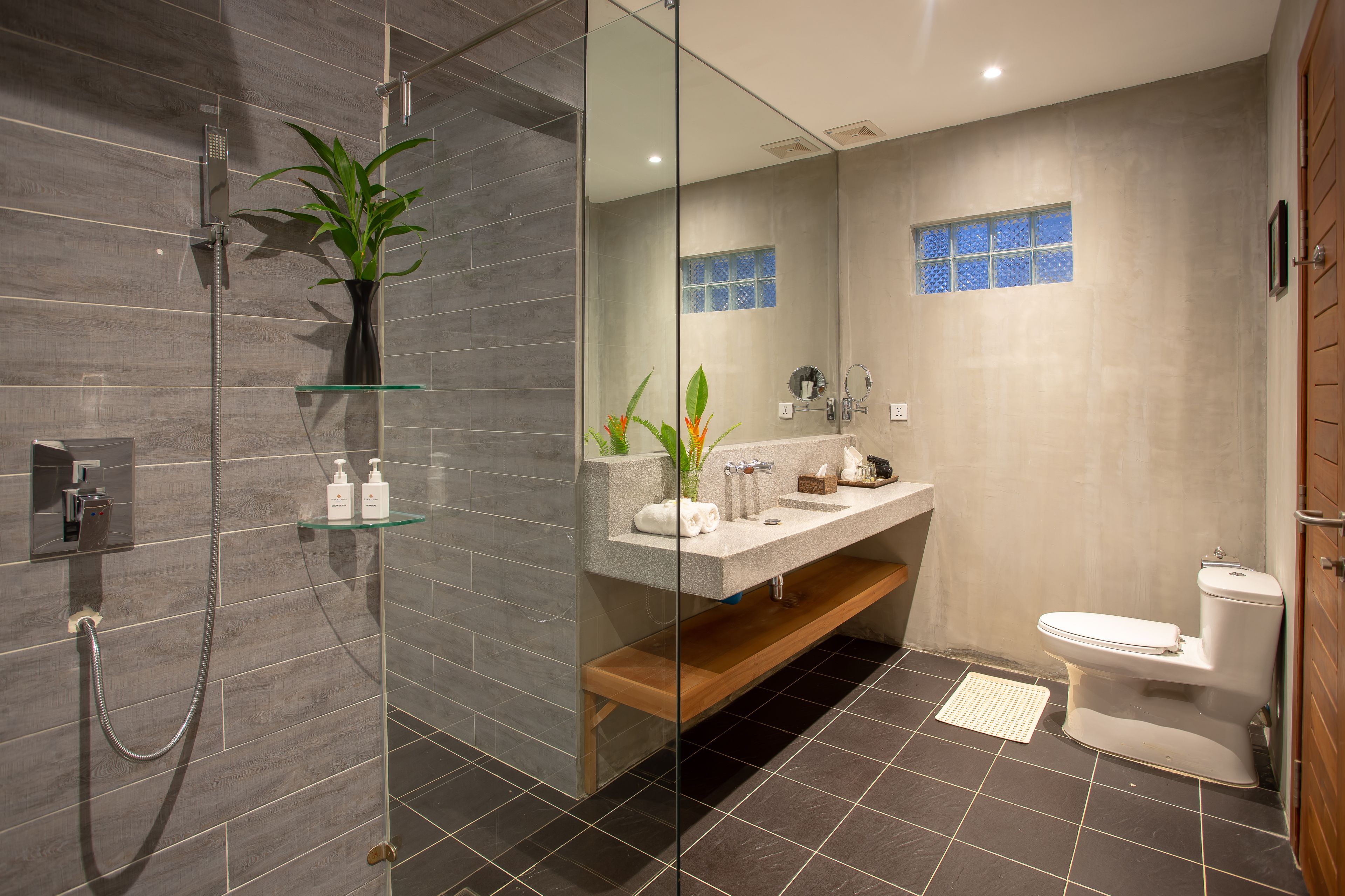 honeymoon suite with balcony | bathroom | designer toiletries, hair dryer, bathrobes, slippers