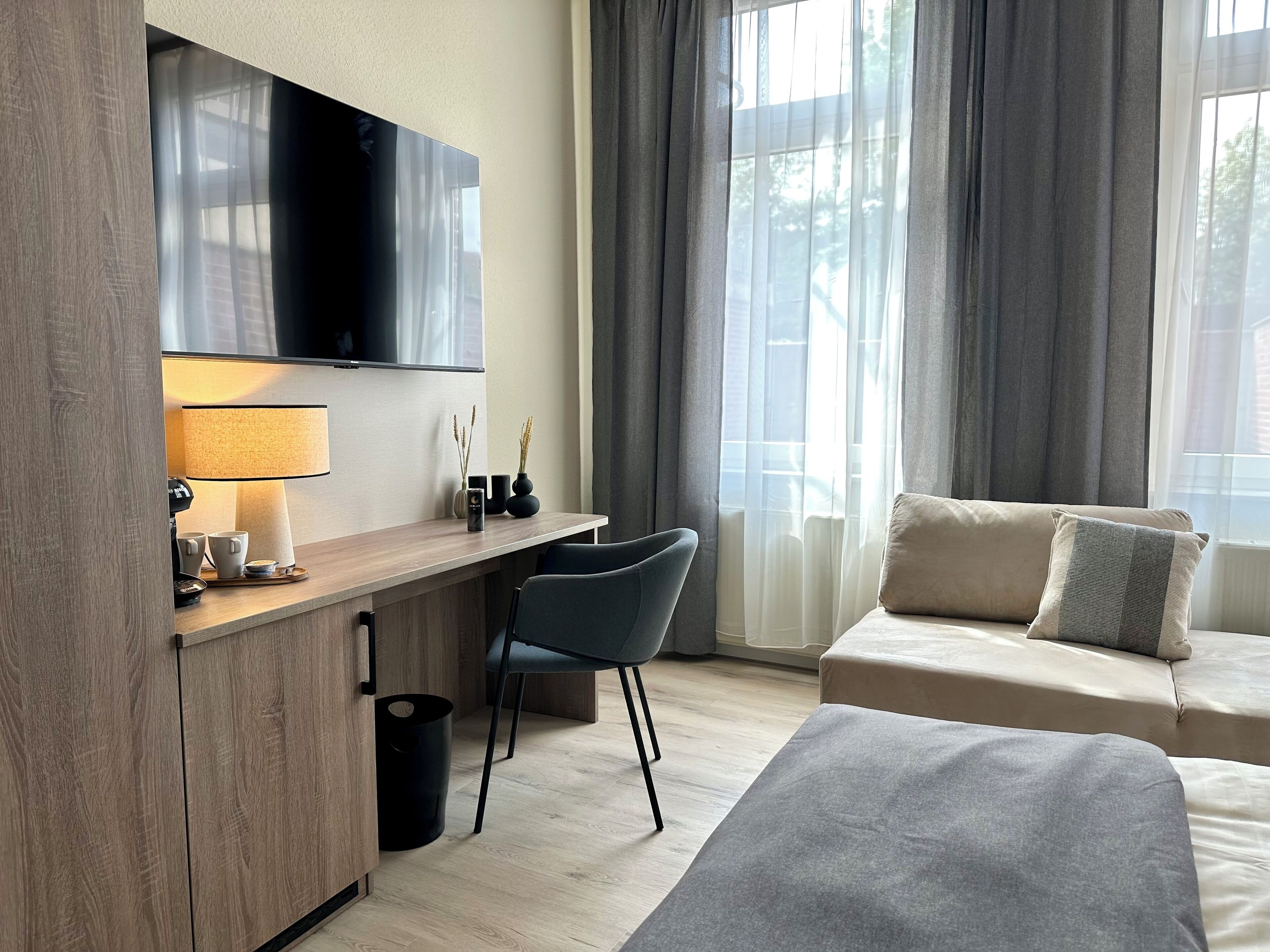 down duvets, desk, laptop workspace, iron/ironing board