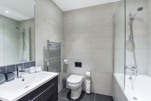 Combined shower/tub, deep soaking tub, rainfall showerhead, hair dryer