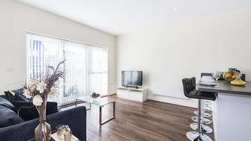 Executive appartement, 2 slaapkamers, 2 badkamers, uitzicht op tuin | 2 slaapkamers, individueel gedecoreerd, individueel gemeubileerd