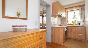 Apartment, Balcony | Private kitchen | Fridge, microwave, oven, stovetop - Haus St. Korbinian (Mittenwald)