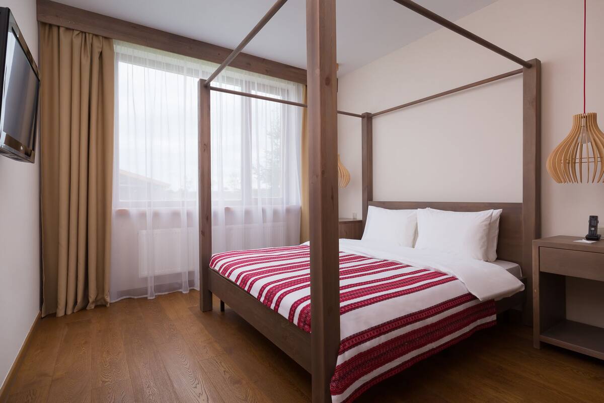 Hypoallergeen beddengoed, een minibar, een kluis op de kamer