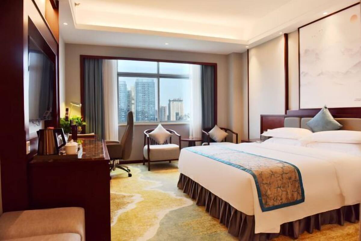 Minibar, desk, laptop workspace, blackout curtains