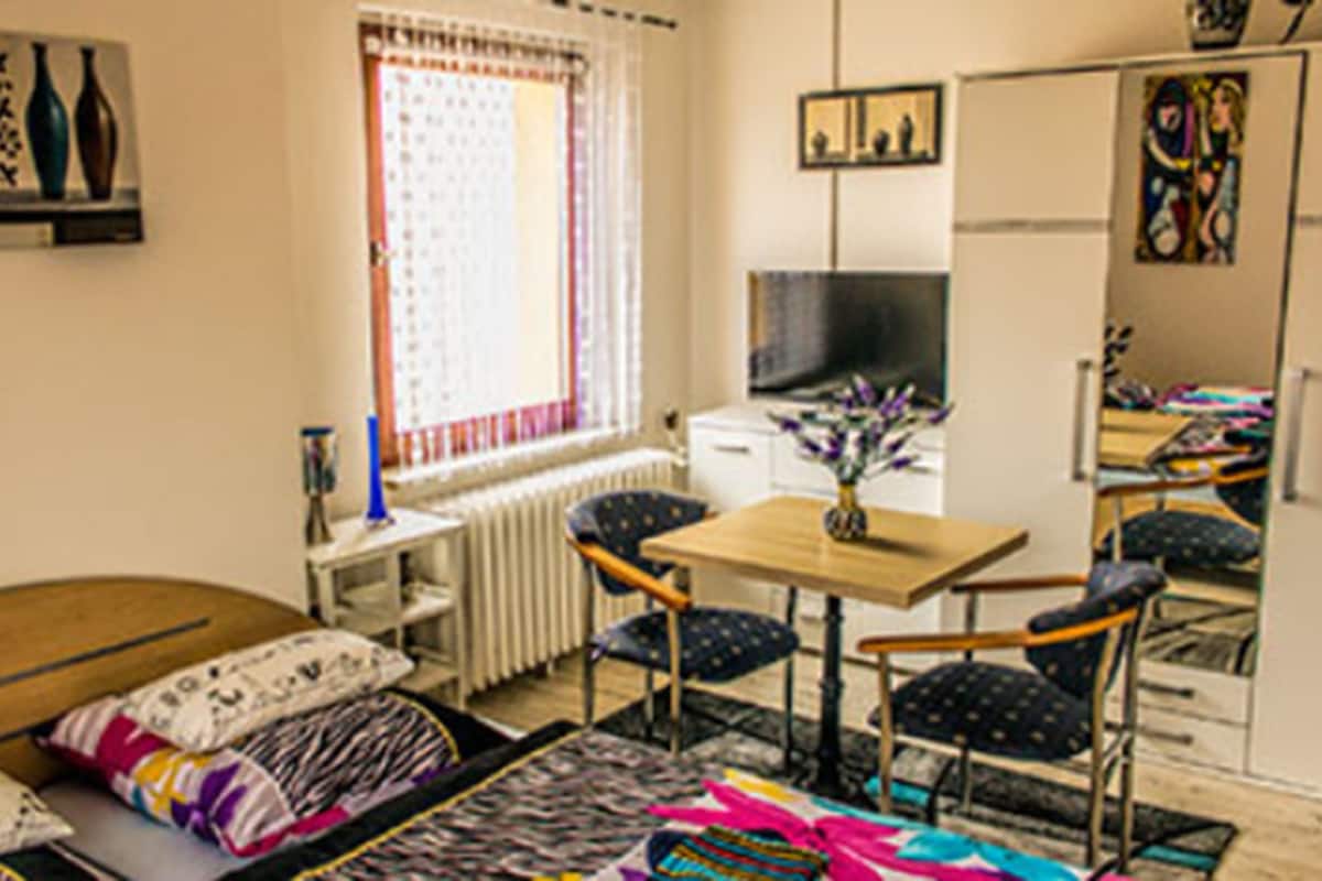 Desk, free WiFi, bed sheets