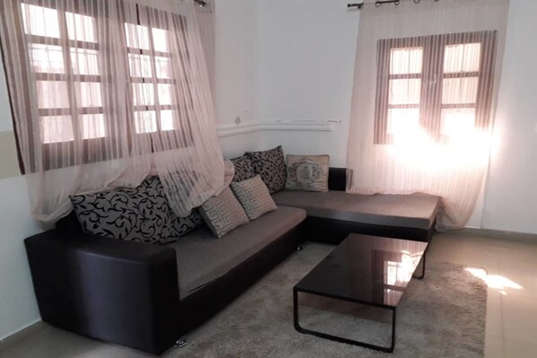 Superior Apartment, 1 Bedroom, Non Smoking | Living area | 32-inch flat-screen TV with satellite channels, TV