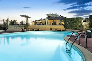 Outdoor pool, pool umbrellas, pool loungers