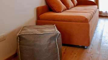 Deluxe Double Room, Balcony | Living room | Flat-screen TV