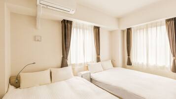 Desk, blackout drapes, free WiFi, bed sheets